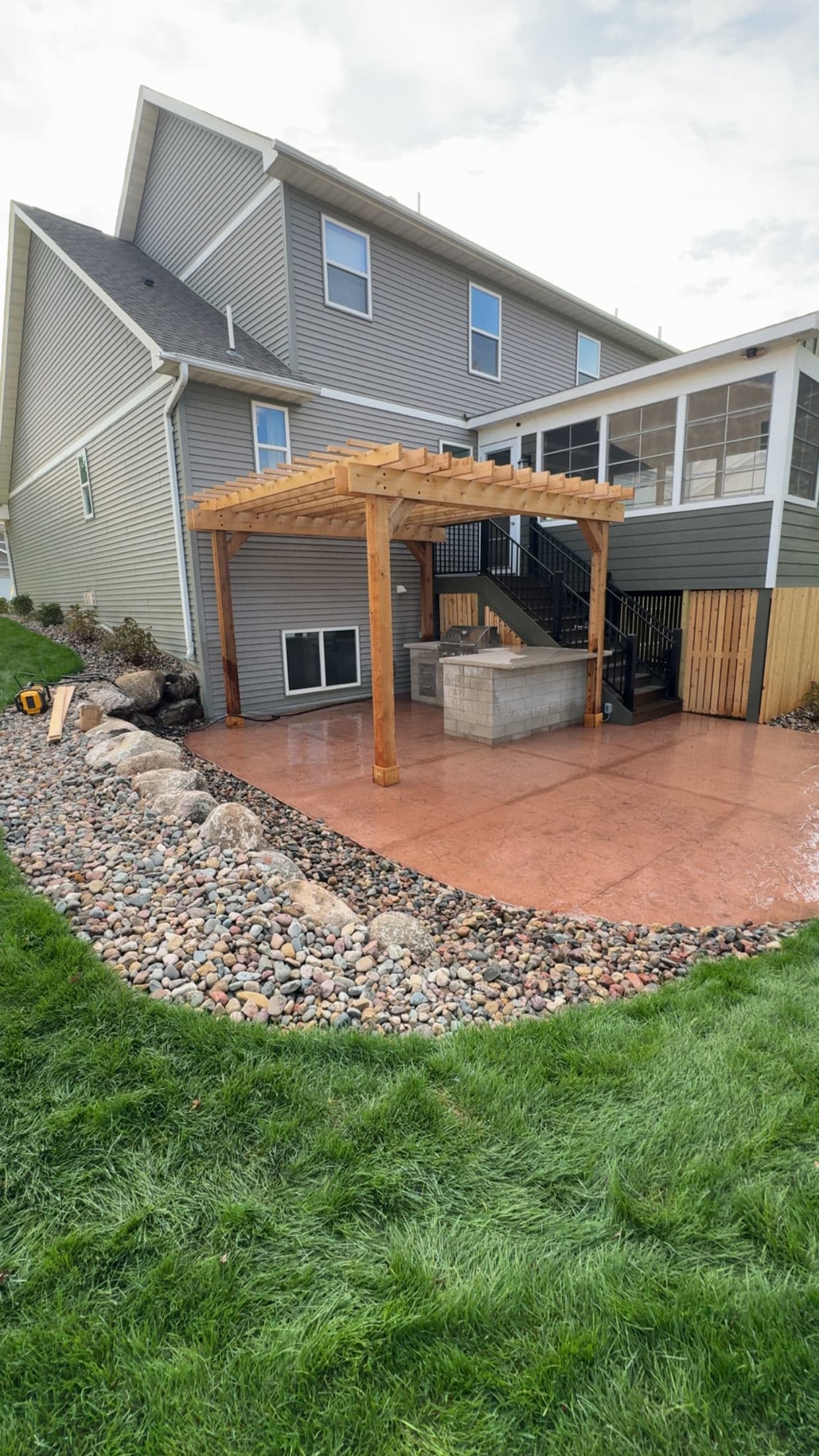 Project Backyard Transformation with Retaining Wall and Outdoor Kitchen in Lakeville image