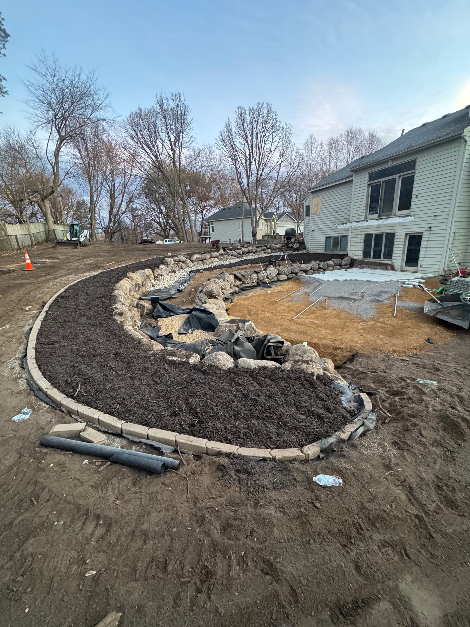 Yard Renovation with Boulder Walls & Paver Patios in Minnetonka